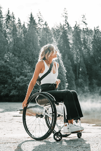 Woman in a wheelchair enjoying nature outdoors
